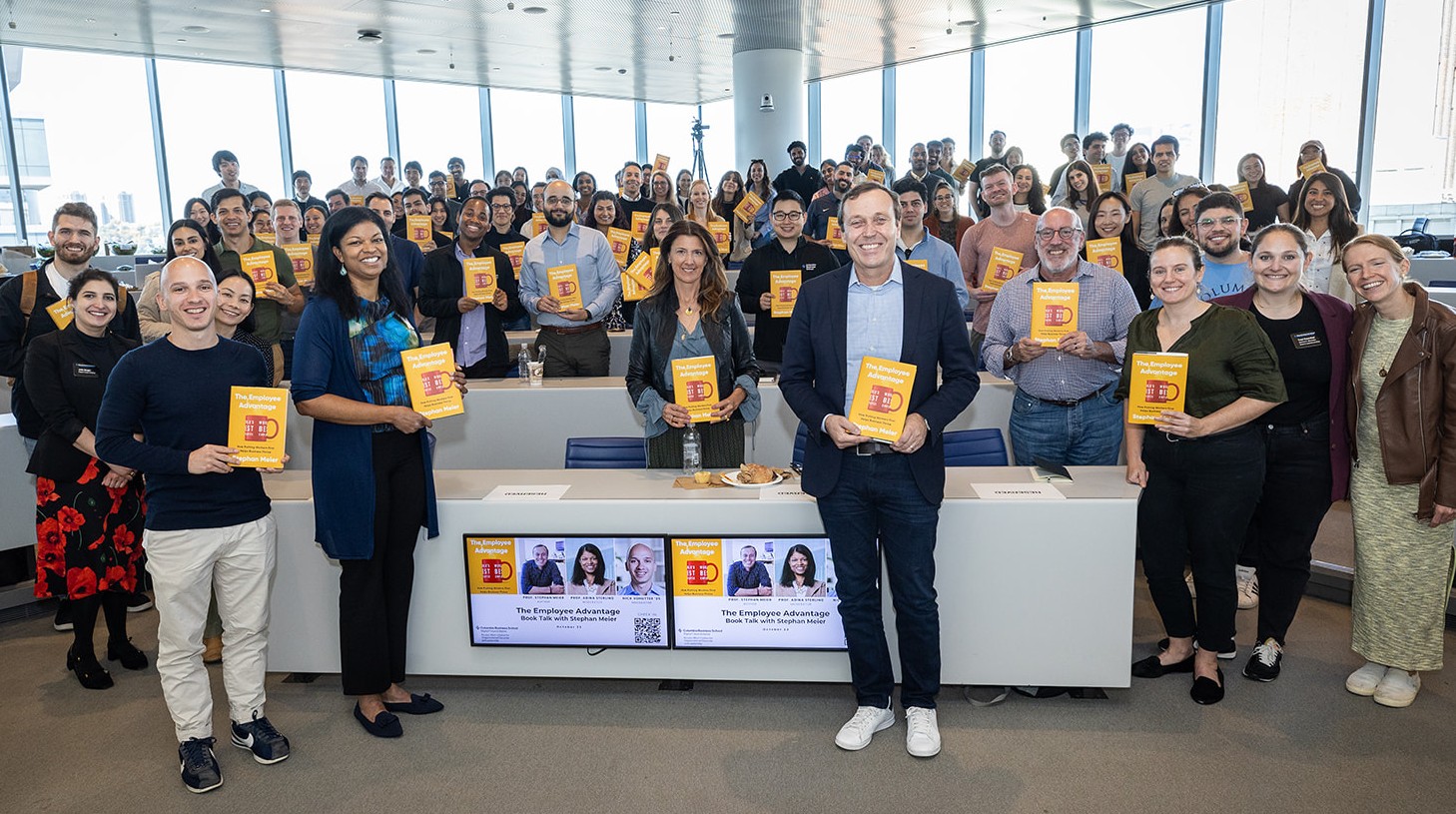 Attendees with books