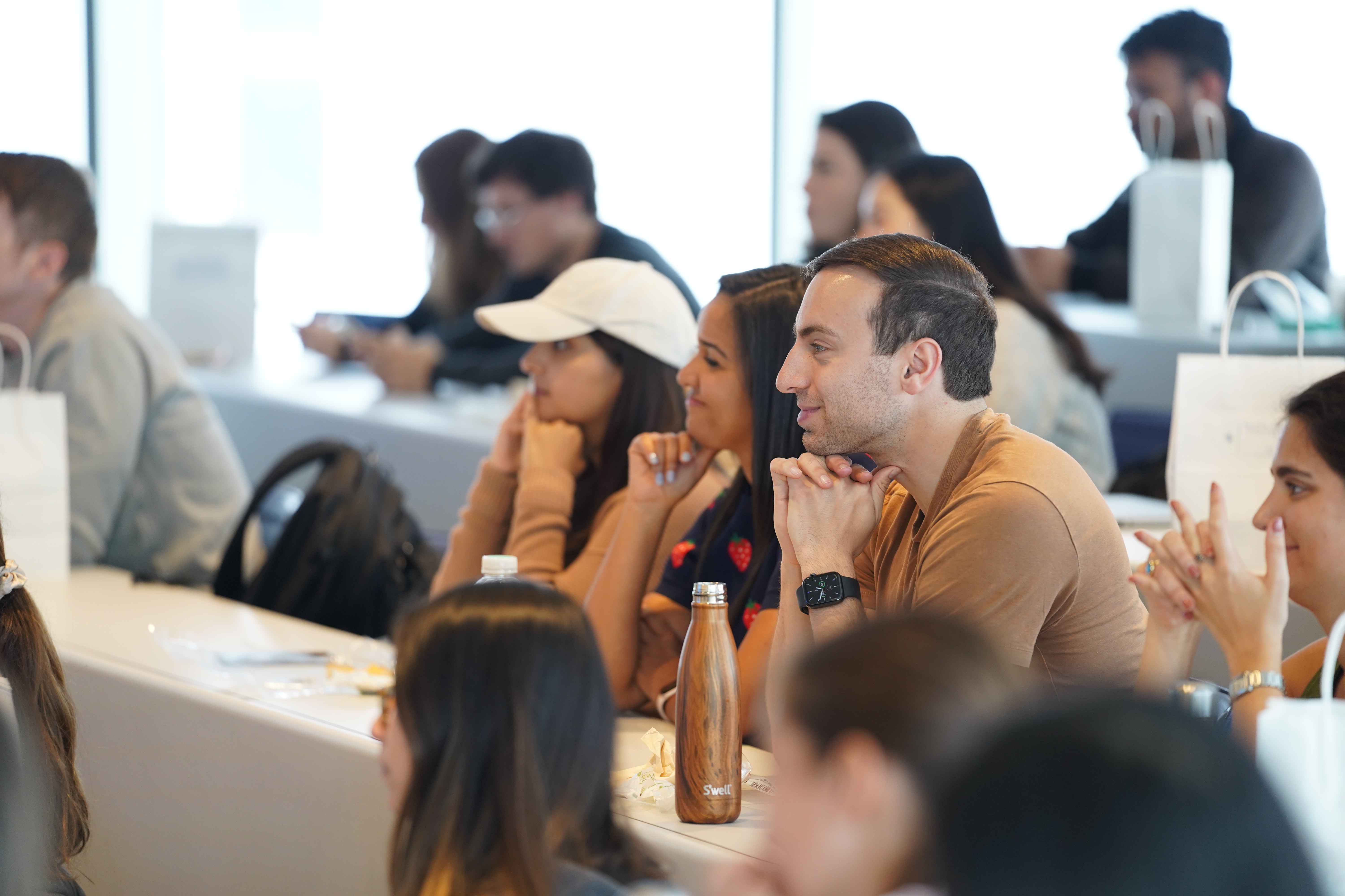 Students listening to a speaker