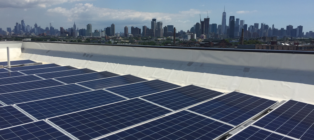 Solar panels against NYC skyline