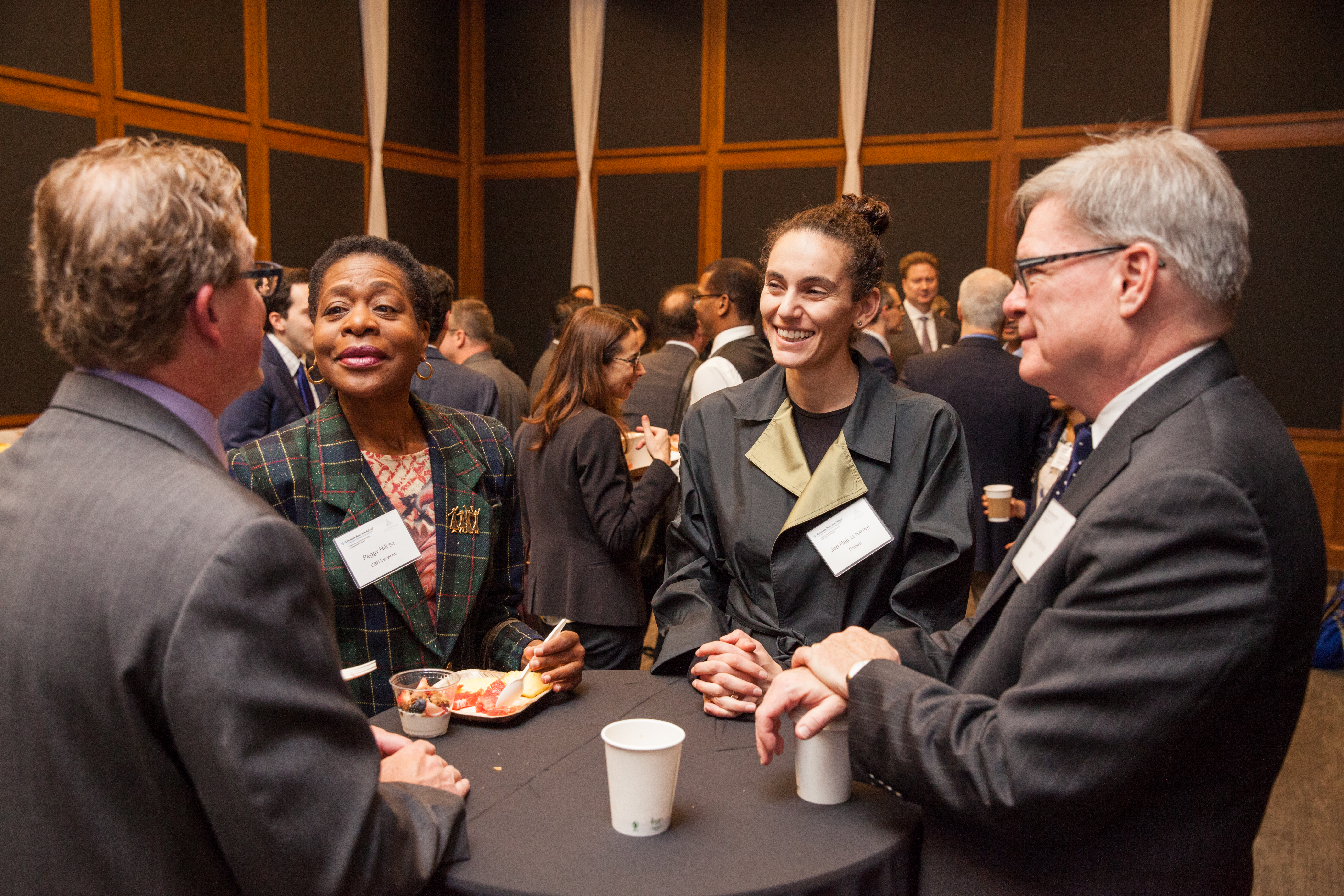 Photo of individuals networking at Gabelli Funds-Columbia Business School Healthcare Symposium.