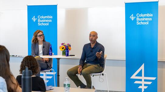 Shelley Stewart III ‘12 sits next to Malia Mason, the Courtney C. Brown Professor of Business at CBS.