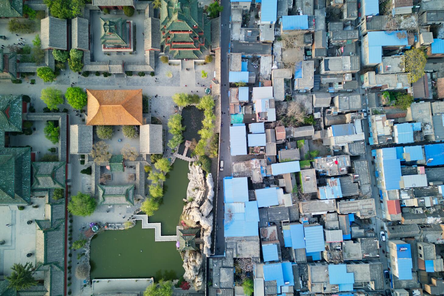 Rich and poor as seen from the sky. Photo by Justin Zhu on Unsplash.