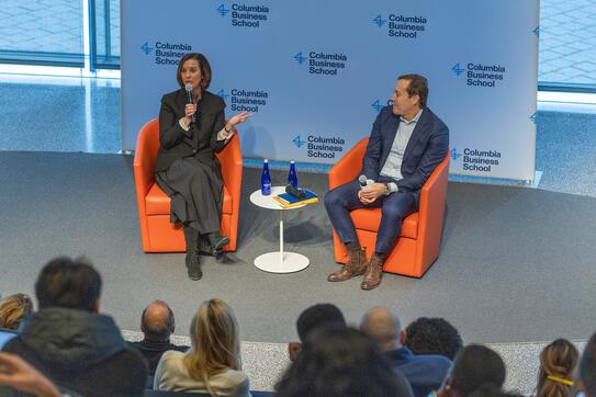 Walmart Chief People Officer Donna Morris, left, with Professor Stephan Meier