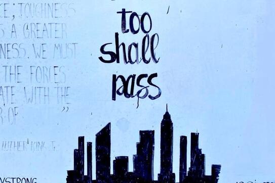 Photo of a drawing saying "This too shall pass"