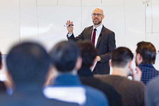 Professor Michael Ewens speaks to the MBA PE Finance Class
