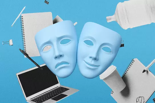 Comedy and tragedy masks surrounded by office supplies.