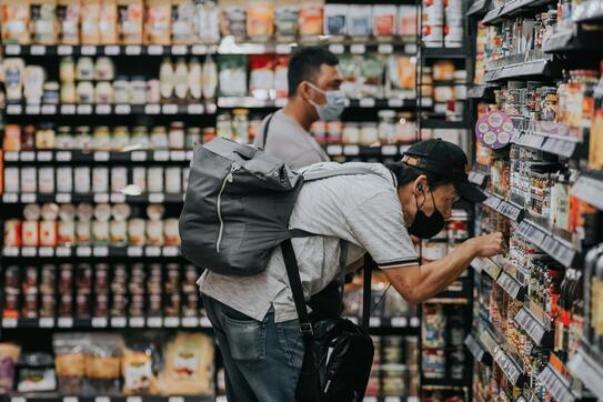 consumers shopping in grocery store