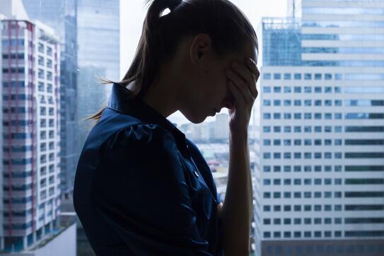 Depressed woman in business