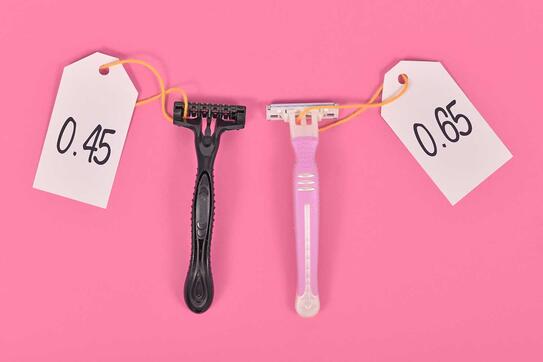 Concept for pink tax showing pink and black razor aimed at specific genders with different price tag