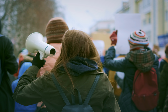 Woman using a megaphone