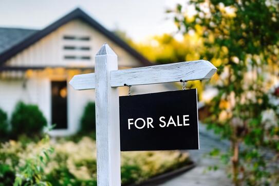 For Sale sign outside of a home