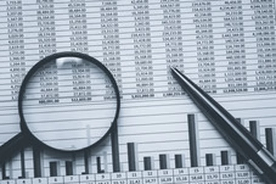 data with graph under a magnifying class