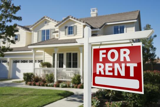A for rent sign outside a house
