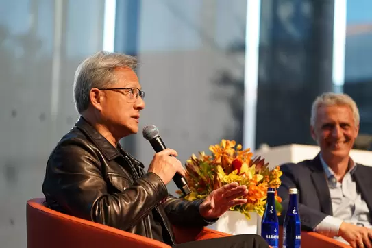 Photo Image of Dean Maglaras and Jensen Huang discussing ai in business