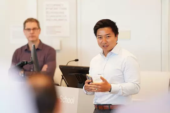 Photo Image of Dan Wang, a faculty director for ai in business