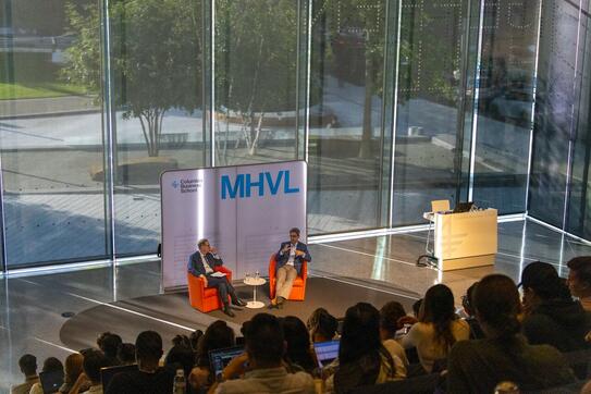 Glenn Hubbard and Oren Cass speaking during a Hub event
