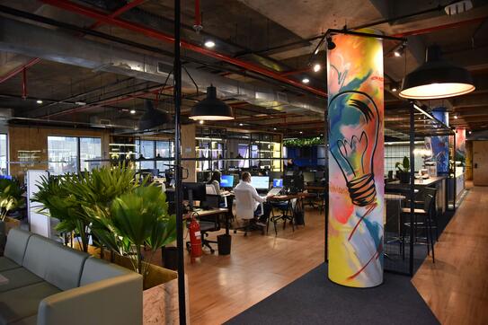 An office with a colorful mural on the wall photo. Photo by Muriel Donzellini – Free Computer Image on Unsplash