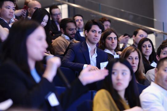 audience members at a large event