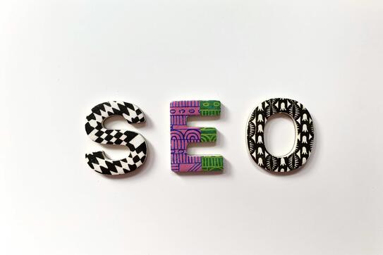 The letters S, E, and O on a white background