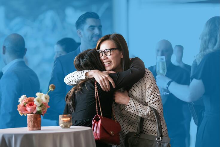 alumni members connecting at reunion