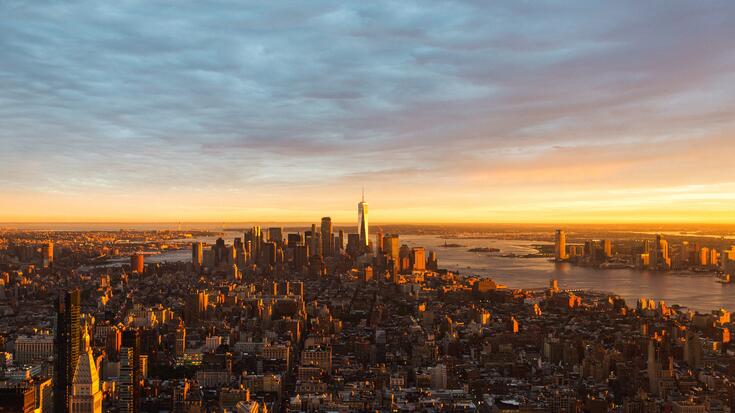 Aerial view of Manhattan at sunrise. Photo by Johannes Hurtig on Unsplash.