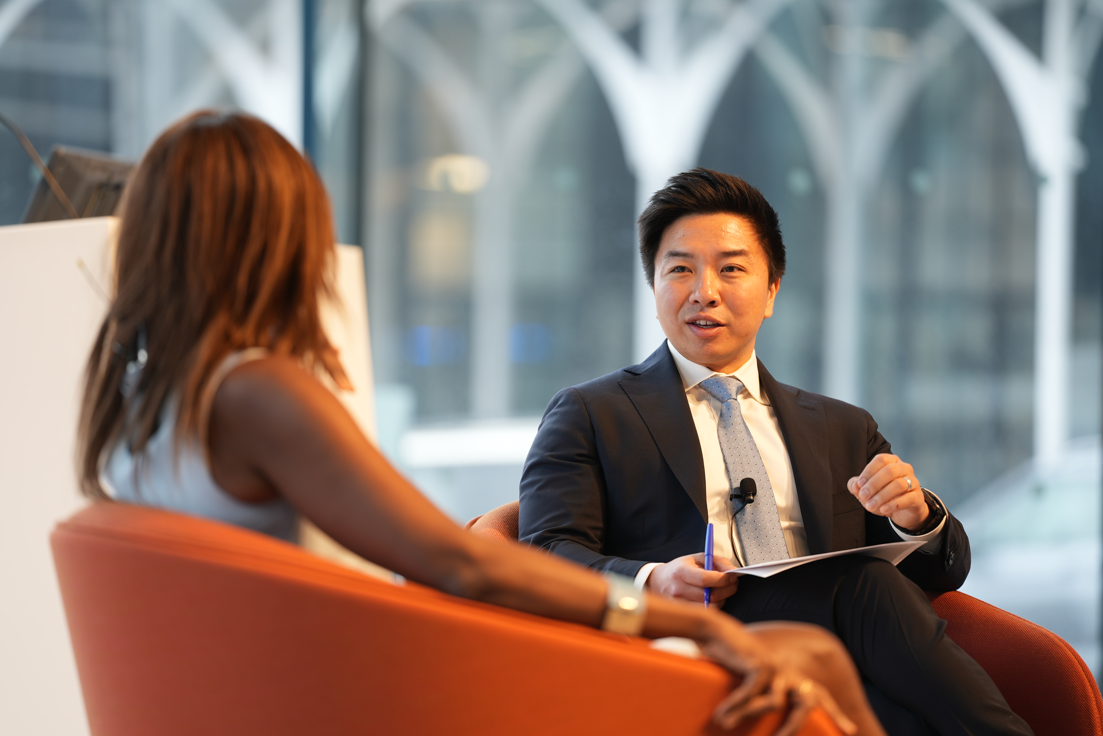 Dan Wang, associate professor of business, with Asahi Pompey ('97 LAW), global head of corporate engagement for Goldman Sachs, Cooperman Commons, Geffen Hall.